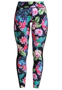Leggings floraux avec un fond noir, ornés de motifs tropicaux vibrants en rose, vert et bleu ; fabriqués en tissu extensible et léger.