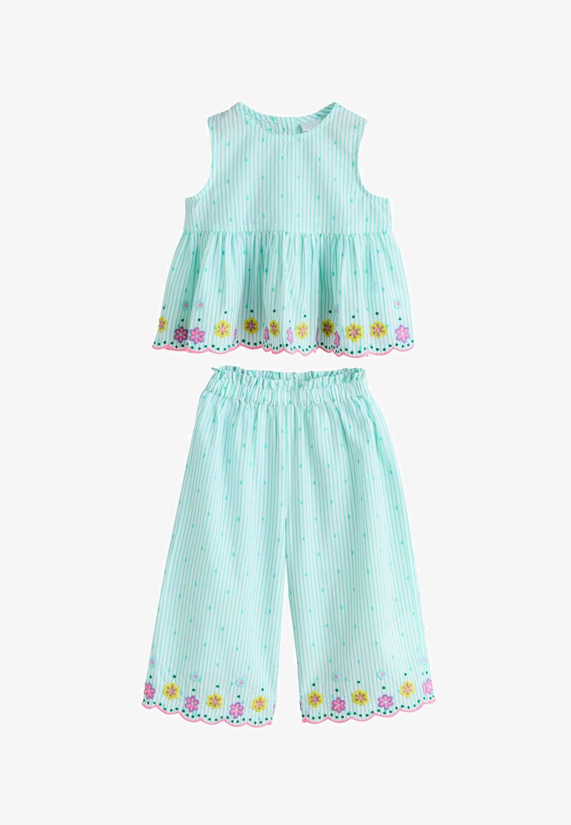 Súprava svetlomodrého pruhovaného tielka bez rukávov a nohavíc s elastickým pásom, zdobená farebnou kvetinovou výšivkou a vlnitými okrajmi.