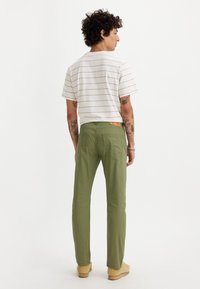 Levi's® 502™ TAPER JEANS - Straight leg jeans - bluish olive