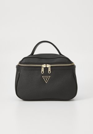 Black synthetic cosmetic bag with a rounded shape, gold zipper, and a front triangular logo. Features a top handle for easy carrying.