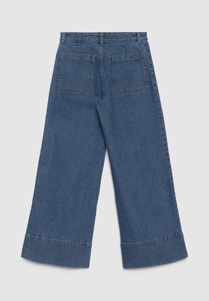 Weit geschnittene Jeans aus Denim in Dunkelblau, mit weicher Textur, zwei Gesäßtaschen und einem rohen Saumabschluss.