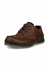 Bruine leren schoenen met zwarte accenten, uitgerust met een vetersluiting, een gevoerde zool en een profielzool voor grip.
