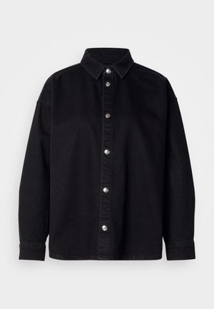 Camicia in denim nero con chiusura a bottoni, collo classico, maniche lunghe e bottoni in metallo argentato. Vestibilità standard con una texture liscia.