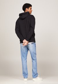 Tommy Jeans GRAFFITI SIGNATURE HOOD UNISEX - Mikina - black