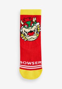 Rote Socke mit einem großen Bowser-Charaktergrafik, gelbem Bündchen und weißem Text, der "BOWSER" liest, mit rot-weißen Streifen.