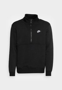Svart Nike sweatshirt med hög krage, halvdragkedja framtill, ribbade muddar och vit logotyp på bröstet. Mjukt material med jämn textur.