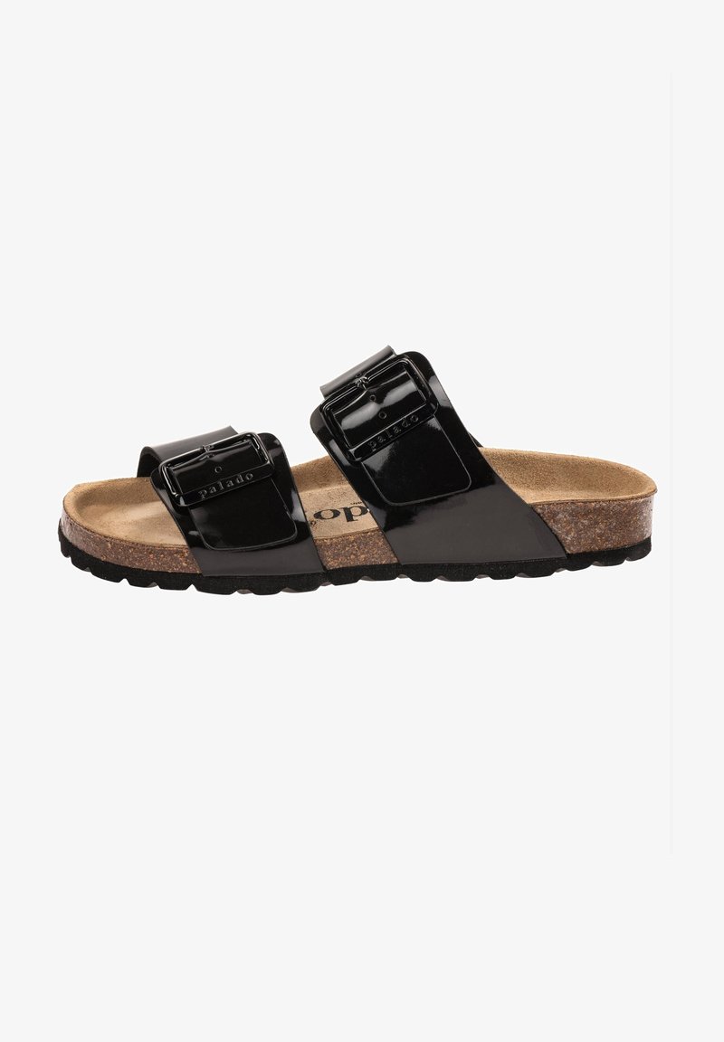 Sandali flat in pelle verniciata nera con due cinturini con fibbia regolabile, soletta in sughero e suola in gomma testurizzata.