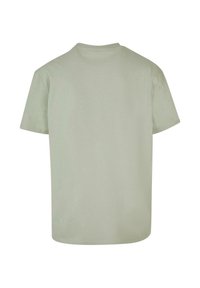 Einfarbig hellgraues T-Shirt mit kurzen Ärmeln und rundem Halsausschnitt, von hinten auf weißem Hintergrund gezeigt.