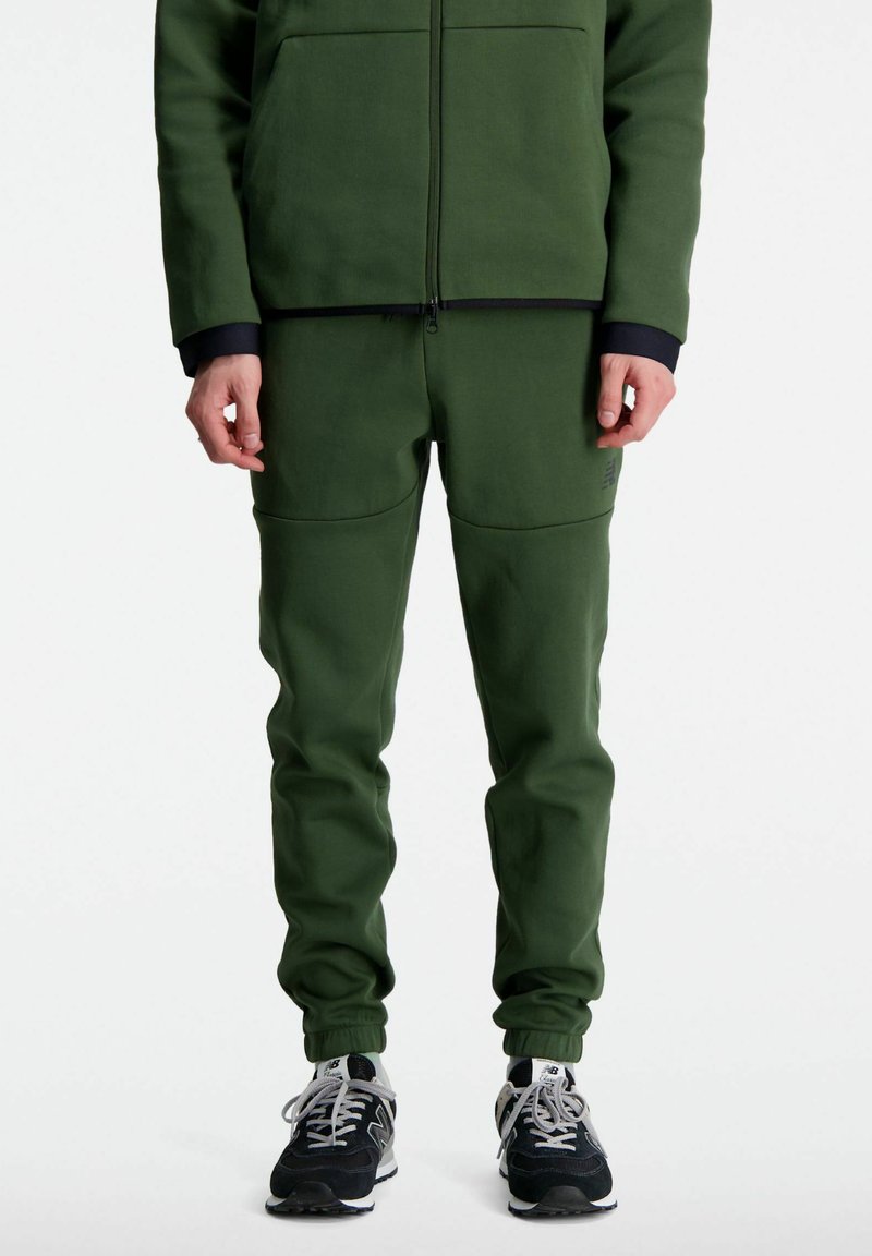 New Balance R W TECH - Pantaloni sportivi - kombu