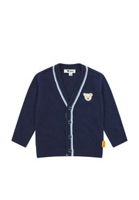 Marineblauwe cardigan van gebreide stof, met een lichtblauwe bies, knopen aan de voorkant en een berenmotief op de borst. Gele label bevestigd.