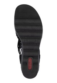 Semelle de sandale noire avec surface texturée, présentant des rainures pour l'adhérence, une zone surélevée avec la marque "rieker" et le numéro de taille visible 37.