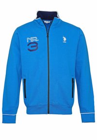 Blå zip-up sweatshirt i fleece. Har ribbade ärmslut, två sidofickor med dragkedja och broderade detaljer med "NR. 3" och en logotyp.