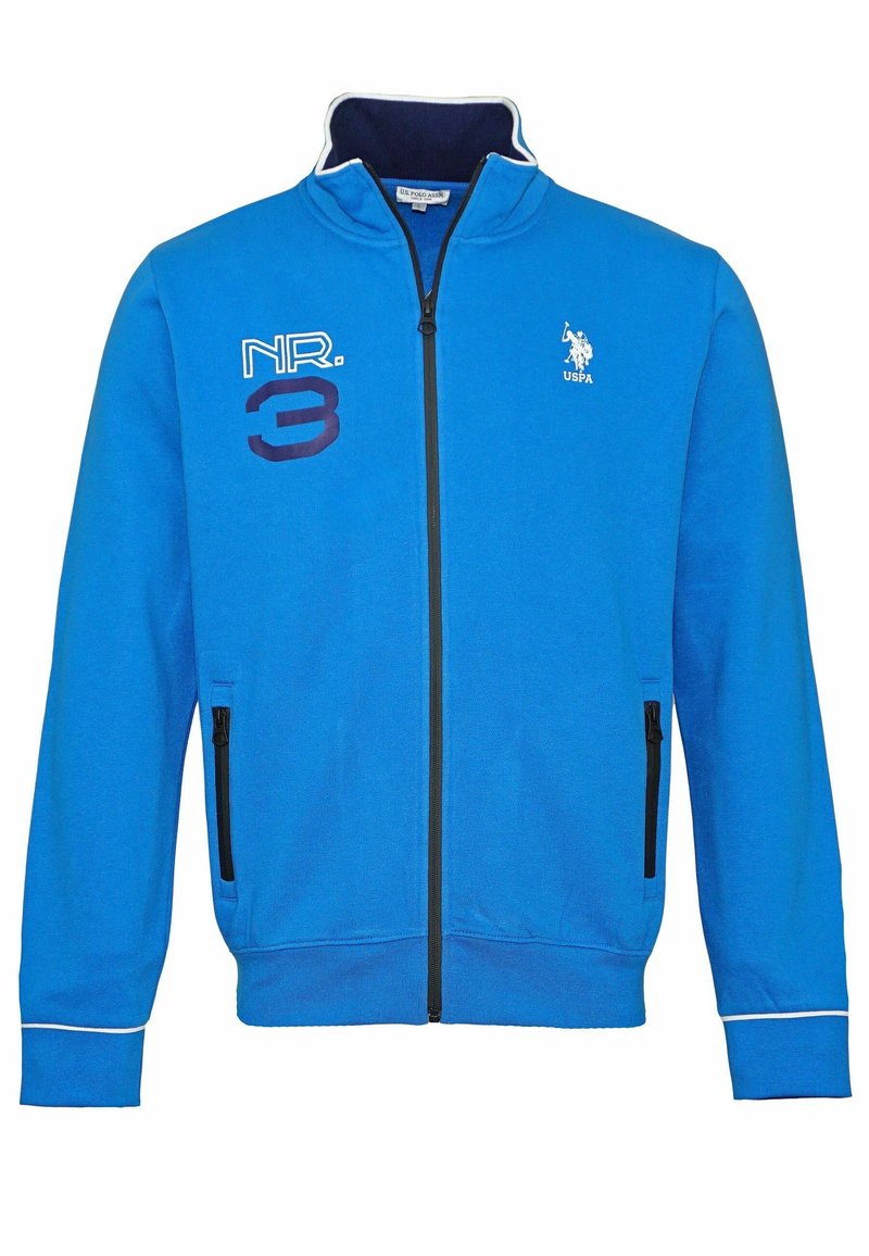 Blå zip-up sweatshirt i fleece. Har ribbade ärmslut, två sidofickor med dragkedja och broderade detaljer med "NR. 3" och en logotyp.