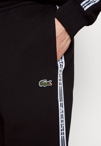 Lacoste Sport Träningsbyxor - black