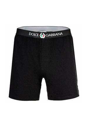 Boxers de algodón negro con una cinturilla elástica que lleva el logo y emblema de "Dolce & Gabbana". Textura suave, diseño clásico.