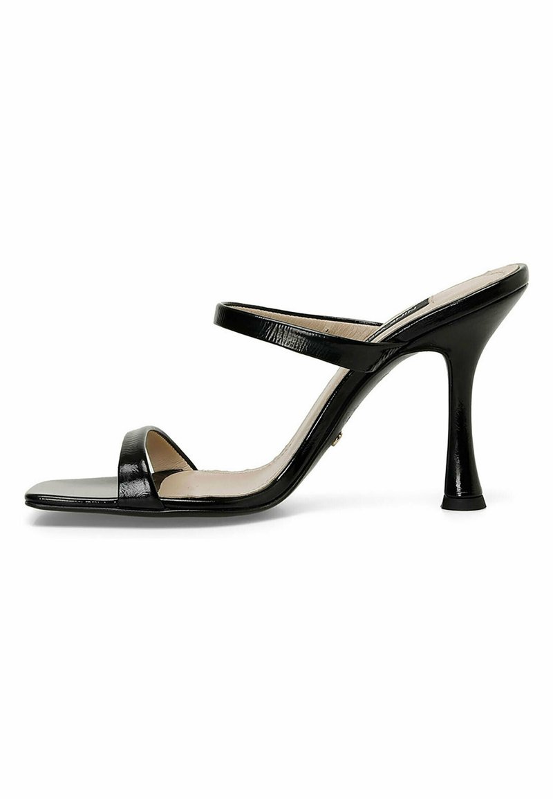 Black patent leather high heel sandal with two thin straps, open toe design, and a tapered heel. Smooth texture with glossy finish.