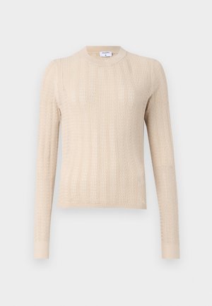 Pull en maille beige avec des manches longues, un col rond et un motif à côtes texturé sur toute la surface. Tissu doux et léger.