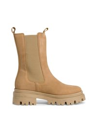 Bottines en suède beige avec des panneaux latéraux élastiques, bout arrondi et semelle épaisse et texturée présentant des rainures profondes pour une meilleure traction.