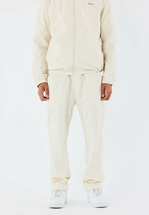 A DÉTAILS BRODÉ - Pantalon classique - craie