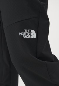 The North Face MOUNTAIN ATHLETICS HYBRID PANT - Szabadtéri nadrágok - black