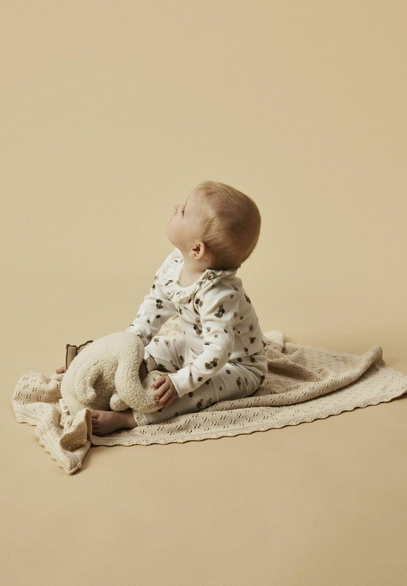 Lil' Atelier STRAMPLER LANGARM - Body - coconut milk