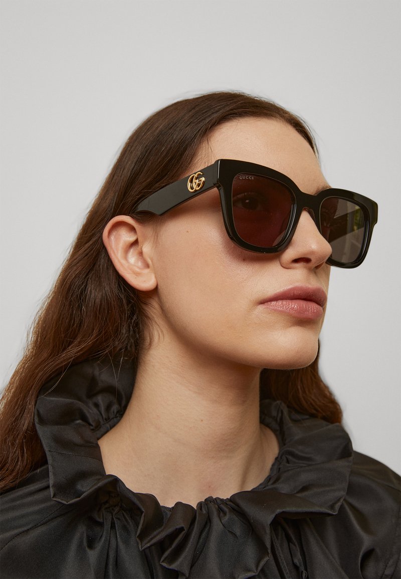 gucci cat eye gg injected sunglasses
