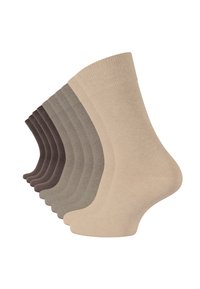 Baumwollsocken in einer Vielzahl neutraler Farbtöne, mit gerippten Bündchen und glatten Texturen, die in einem versetzten Arrangement präsentiert werden.