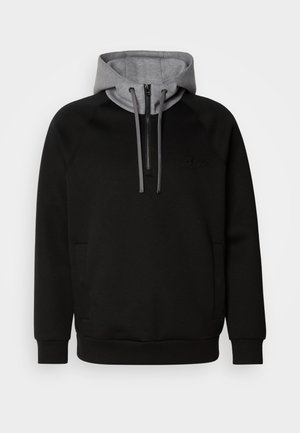 Black zip-up hoodie with a gray hood, featuring a front pocket, drawstrings, and a subtle logo. Made of soft fabric with a smooth texture.