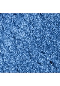 Gros plan d'une surface texturée bleue rugueuse et granuleuse avec de petites particules brillantes éparses et un motif irrégulier.