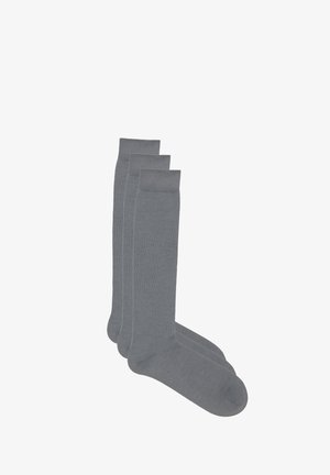 Calze lunghe fino al ginocchio in cotone grigio, con polsino a coste e texture liscia, presentate in un set da tre paia.