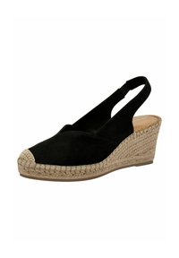 Černé semišové wedge slingback boty s tkaným jutovým lemem a zakrytou špičkou. Mají nakloněný, otevřený design a elastický pásek pro podporu.