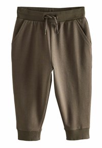Jogginghosen aus Baumwollmischung in dunkeloliv mit elastischem Bund, Kordelzug, seitlichen Taschen und gerippten Bündchen. Glatte Textur über die gesamte Fläche.