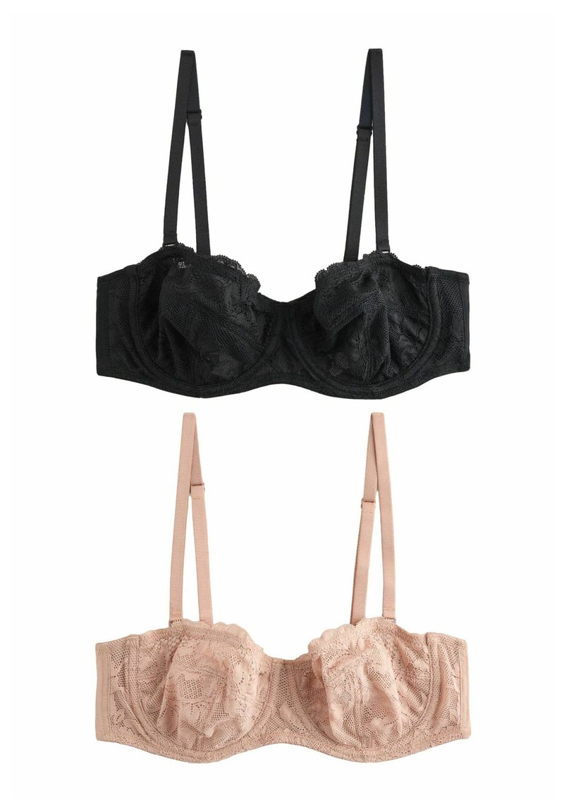Zwarte kanten beha met beugel bovenop, beige kanten beha met beugel daaronder. Beide hebben verstelbare bandjes en bloemenkantpatronen.