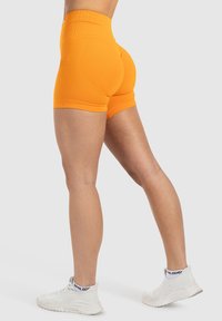 Smilodox EDINA SEAMLESS SCRUNCH - Tights - orange
