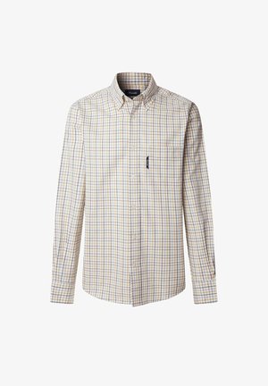 Chemise à carreaux jaune, bleue et blanche. Boutonnée avec un col pointu, des manches longues et une poche sur la poitrine. Tissu léger.