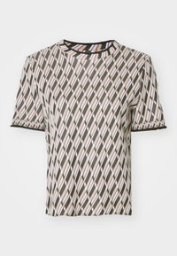 Short-sleeve top featuring a diamond pattern in beige, pink, and black. Round neckline, textured fabric, and contrast trim at sleeves.