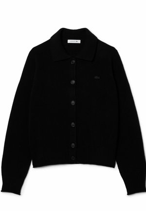 Cardigan noir boutonné avec manches longues et col, avec un petit logo Lacoste sur la poitrine gauche.
