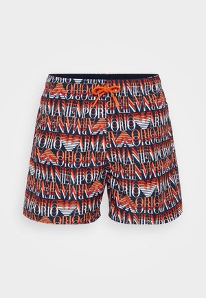 Bañador con un patrón multicolor de logotipos en rojo, blanco y azul. Material ligero con una cintura elástica y cordón.