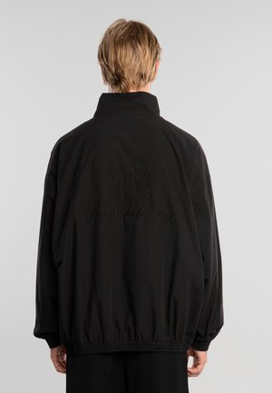 Chaqueta fina - black