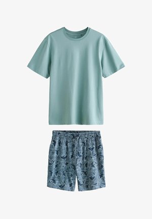 Light blue short-sleeve T-shirt paired with blue elastic waist shorts featuring a dark shark pattern.