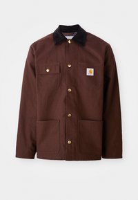 Brown cotton jacket with a black corduroy collar, gold buttons, two chest pockets, and a square logo patch on the left pocket.