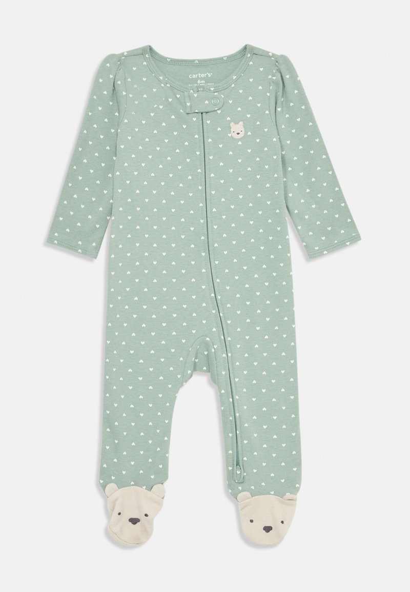 Green onesie made of soft fabric, featuring white heart patterns, long sleeves, a snap closure, and bear face accents on the feet.