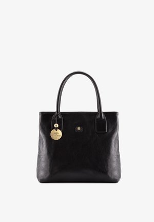 Czarna skórzana torba typu tote z dwoma rączkami i okrągłym złotym zawieszonym logo Wittchen przy lewym uchwycie.