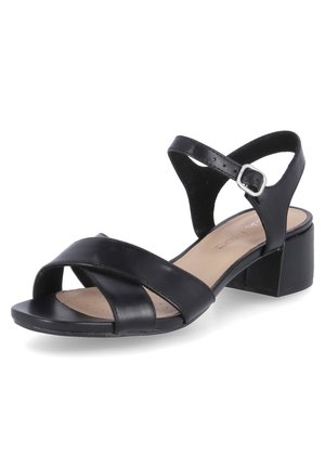 Czarna skórzana sandała na niskim, blokowym obcasie, z krzyżującymi się paskami przy palcach oraz regulowanym paskiem wokół kostki. Gładka powierzchnia, minimalny wzór.