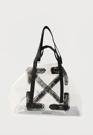Bolsa tote blanca transparente con diseño de pinceladas cruzadas en negro y asas negras con la marca "Off-White" sobre un fondo blanco.