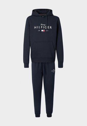 Granatowy bawełniany dres z kapturem, bluza z kieszenią z przodu i logo, w zestawie z pasującymi spodnie dresowe na elastycznym pasie i z mankietami.