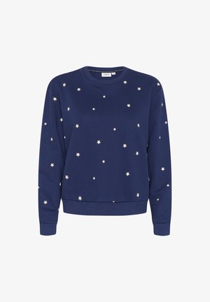 Jūras flotes mikina ar krēmkrāsas zvaigznēm, kas izdrukātas uz virsmas, ar apaļu kakla izgriezumu un garām piedurknēm, izgatavota no mīksta kokvilnas maisījuma.