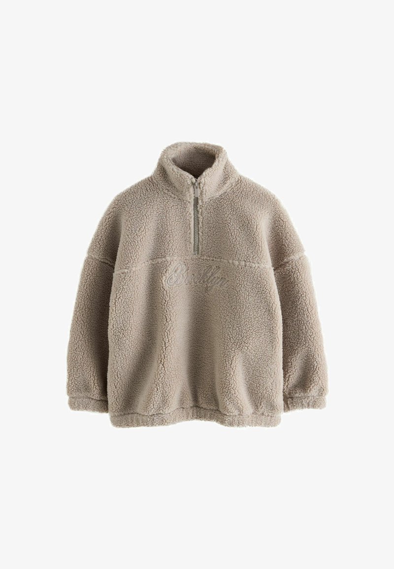 Beige sherpa fleece pullover with quarter zip and "Brooklyn" embroidered on the chest, featuring long sleeves and a high collar.