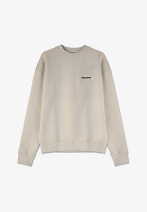 Kremowa bluza z ribbowanymi mankietami i kołnierzem, z fakturowanym wzorem oraz czarnym logo "PEGADOR" po lewej stronie klatki piersiowej.