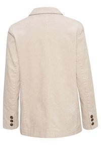 Veste en velours côtelé beige avec un col cranté, des manches longues et des poignets à trois boutons. Présente une texture côtelée verticale. Vue de dos.